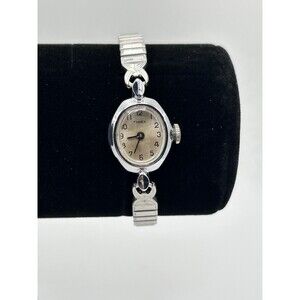 Works Vtg Timex Oval Ladies Watch Cream Dial Silver Tone Stretch Band 17mm Runs